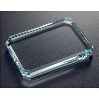 Optical facet paperweight